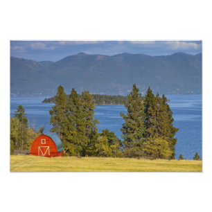 Red barn sits along scenic Flathead Lake near Photo Print