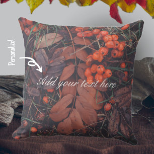 Red berries and brown autumn leaves throw pillow