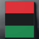 Red, Black and Green Flag Plaque<br><div class="desc">The 3 Pan-African colours on the flag represent: RED: the blood that unites all people of Black African ancestry, and shed for liberation; BLACK: black people whose existence as a nation, though not a nation-state, is affirmed by the existence of the flag; and GREEN: the abundant natural wealth of Africa....</div>