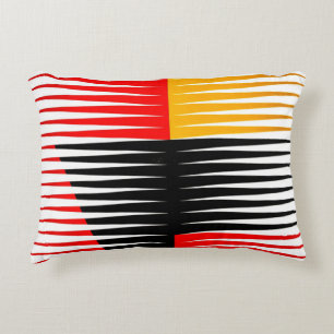 Red, black, and yellow artwork accent pillow
