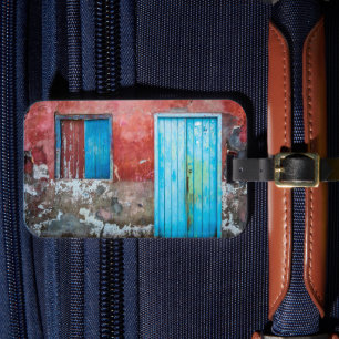 Red, blue and grey wall, door and window luggage tag