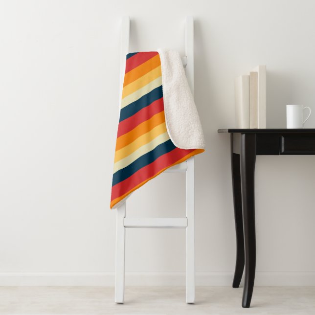 red, blue, orange and yellow stripes sherpa blanket (In Situ)
