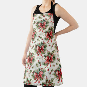 Red bow on holiday greens apron