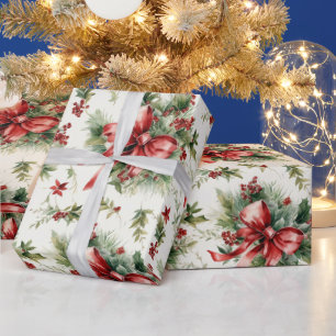 Red bow on holiday greens wrapping paper