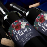 Red Burgundy White Navy Blue Floral Cheers Wedding Wine Label<br><div class="desc">Cheers typography script and a watercolor red burgundy and white peony flowers bouquet with pine green seasonal fir branches, red berries and foliage together with your name / names over a dark midnight navy blue chalkboard background making an inspired personalized wine label for your Christmas rustic elegant floral wedding or...</div>