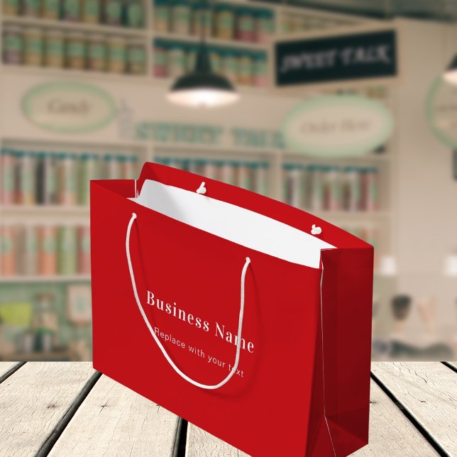 Red business name text paper shopping bag (Creator Uploaded)