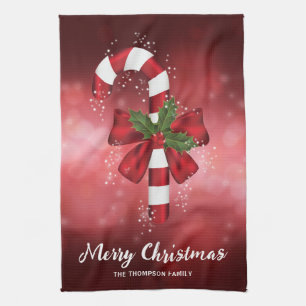 Red Candy Cane On A Red Bokeh Background Kitchen Towel
