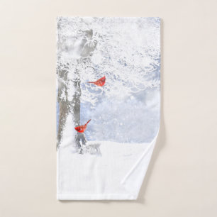 Red Cardinal Bird in beautiful snowy Tree Hand Towel
