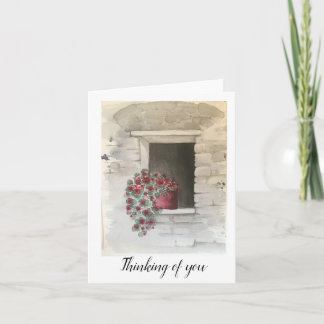 Red cascading geranium flower pot in brick window card