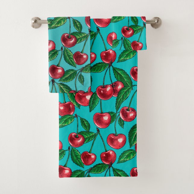 Red cherries on turquoise bath towel set (Insitu)