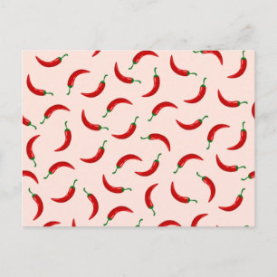 Red chili peppers on light coloured background postcard