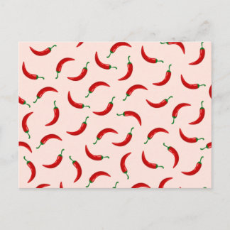 Red chili peppers on light coloured background postcard