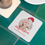 Red Christmas Santa Hat Cute Party Square Paper Coaster<br><div class="desc">Celebrate the season with Merry Christmas party supplies featuring a cute red and white design! 🎄✨ This festive item showcases a watercolor Santa Claus hat, whimsical calligraphy script, and a circle photo template to personalize with your custom family name. Perfect for holiday parties, this classic Xmas decor blends simple minimalist...</div>