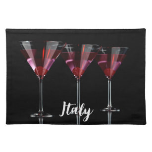 Red cocktails in martini glass with cherry placemat