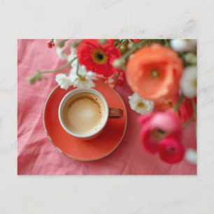 Red coffee cup surrounded by Ranunkel flowers Postcard