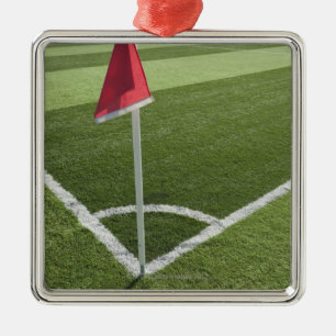 Red corner flag on soccer field metal ornament