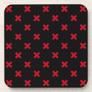 Red cross stitches on black coaster