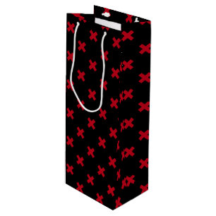 Red cross stitches on black wine gift bag
