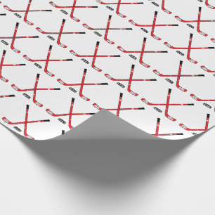 Red Crossed Hockey Sticks and Puck Wrapping Paper