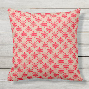 Red dotted star on taupe outdoor pillow