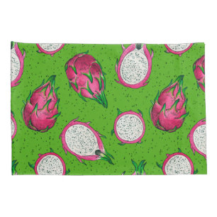 Red dragon fruit on green pillowcase