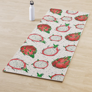 Red dragon fruit on off white yoga mat