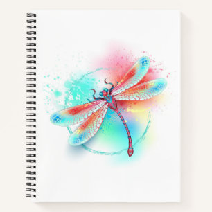 Red dragonfly on watercolor background notebook