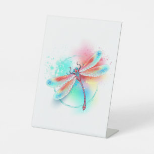 Red dragonfly on watercolor background pedestal sign