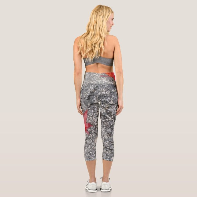 Red fall leaf in rain on grey textured road capri leggings (Back)