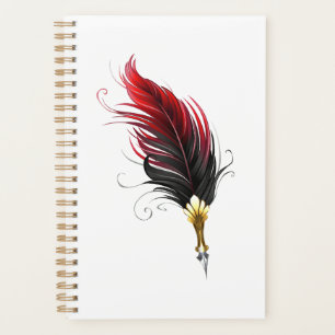 Red feather pen with gold nib planner