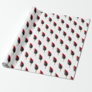 Red feather pen with gold nib wrapping paper