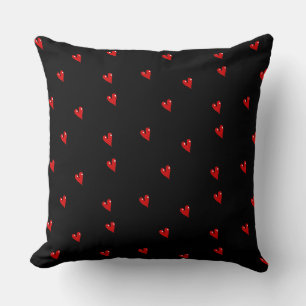 Red glossy hearts on black throw pillow