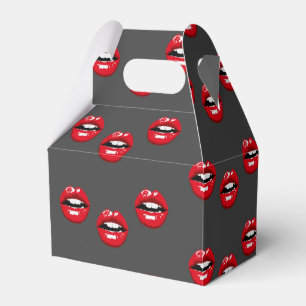 Red glossy lips on grey favor box