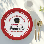 Red Graduate Personalized 2024 Graduation Party Paper Plate<br><div class="desc">These modern red and white custom graduation party plates feature classy typography of your university or college name for the class of 2024. Customize with your graduating year next to the chic handwritten script and black grad cap for great personalized congratulations graduate party decor.</div>