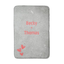 Red graffiti name on grey concrete, your