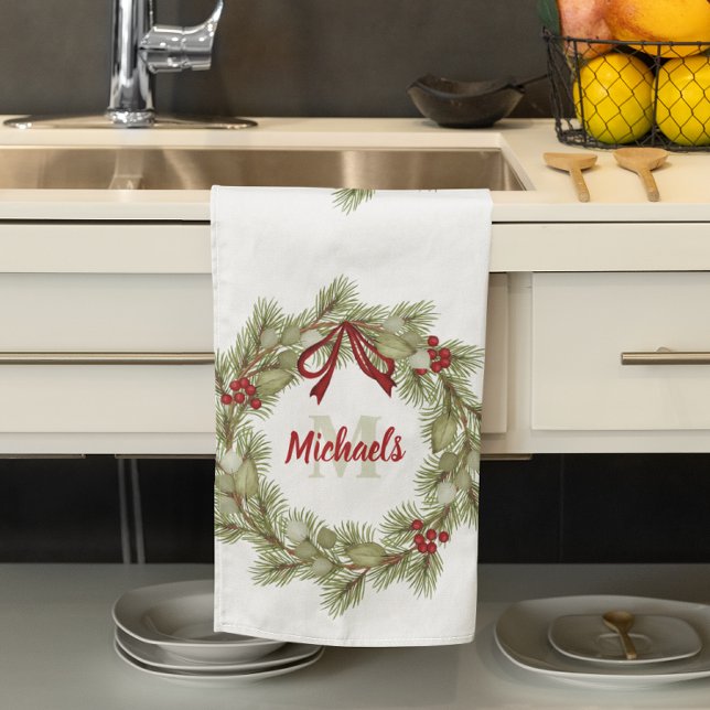 Red Green Christmas Wreath Custom Name Holiday Kitchen Towel (Christmas greenery wreath with red ribbon customized with monogram. )