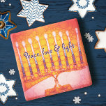 Red Hanukkah Menorah Peace Love Light Script Bold Stone Coaster<br><div class="desc">“Peace, love & light.” A close-up photo of a bright, colourful, red orange and yellow gold artsy menorah helps you usher in the holiday of Hanukkah in style. Feel the warmth and joy of the holiday season whenever you relax with your favourite beverage on this stunning, colourful Hanukkah stone coaster....</div>