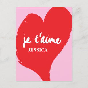 Red heart with je t’aime-text on pink background postcard