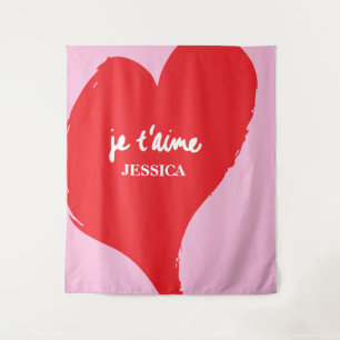 Red heart with je t’aime-text on pink background tapestry