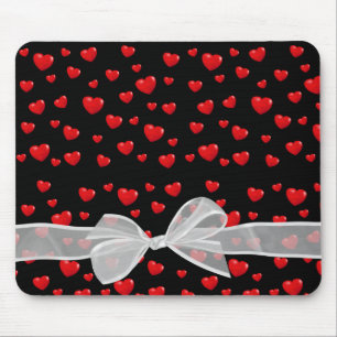 red hearts and bow on black mouse pad