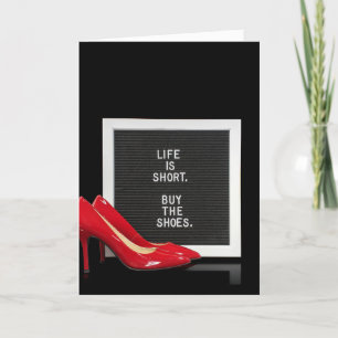 Red high  heel shoes with message board card