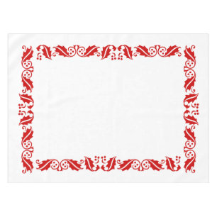 red hollies in white tablecloth