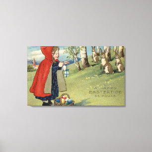 Red Hooded Girl Handing Eggs to Rabbits Canvas Print