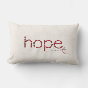 red Hope text stitch with needle Lumbar Pillow