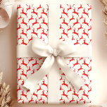 Red Jumping Deer Christmas Wrapping Paper<br><div class="desc">Add a classic and festive touch to your holiday gifts with this red jumping deer Christmas wrapping paper. Featuring a playful pattern of reindeer silhouettes in vibrant red on a white background, this wrapping paper is perfect for any Christmas celebration. Ideal for wrapping gifts for friends, family, or colleagues, this...</div>