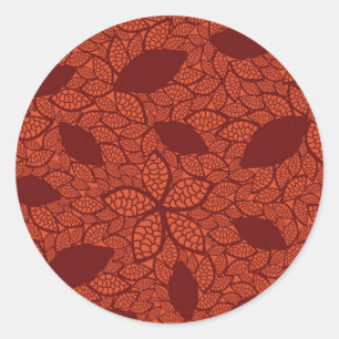 Red leaves pattern on orange classic round sticker