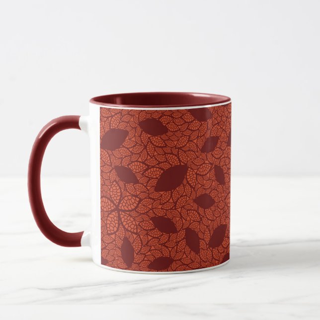 Red leaves pattern on orange mug (Left)
