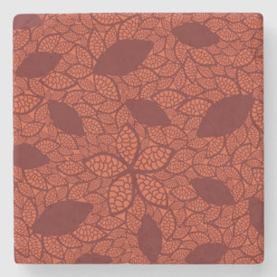 Red leaves pattern on orange stone coaster