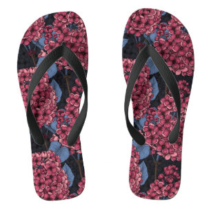 Red lilac on dark blue flip flops