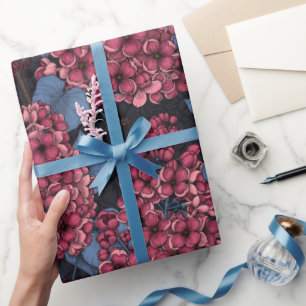 Red lilac on dark blue wrapping paper